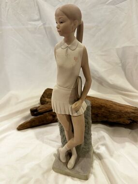 Lladro Tennis Player Girl figurine